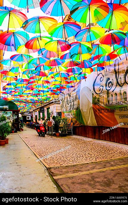 Bucharest, Romania, May 17, 2019: Cafe with colorful umbrellas on a street in Bucharest