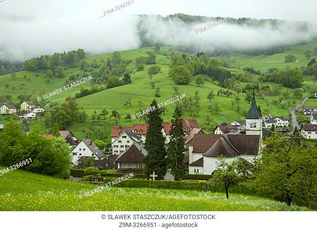 Misty spring day in Bärschwil village, canton Solothurn, Switzerland