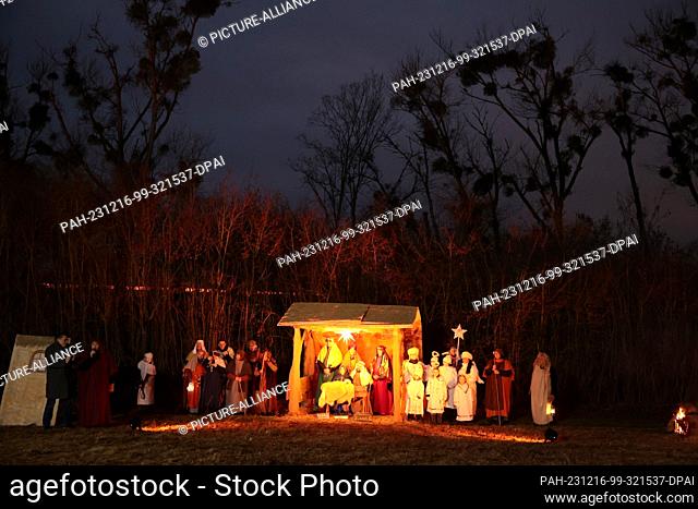 16 December 2023, Saxony-Anhalt, Beyendorf: Amateur actors re-enact the Christmas story in the Sohlen mountains. The traditional ""Beyendorf Forest Christmas""...