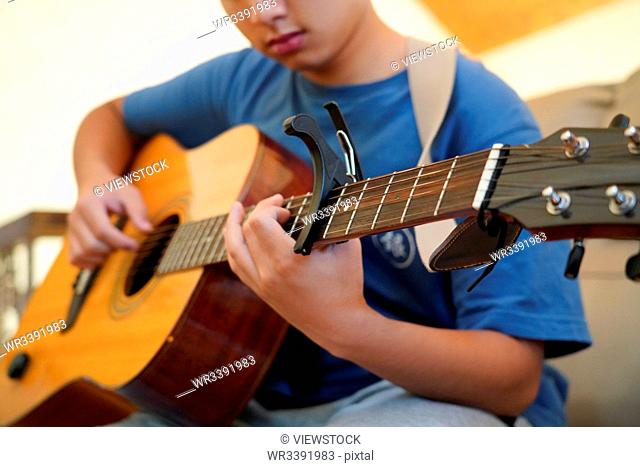 Playing the guitar