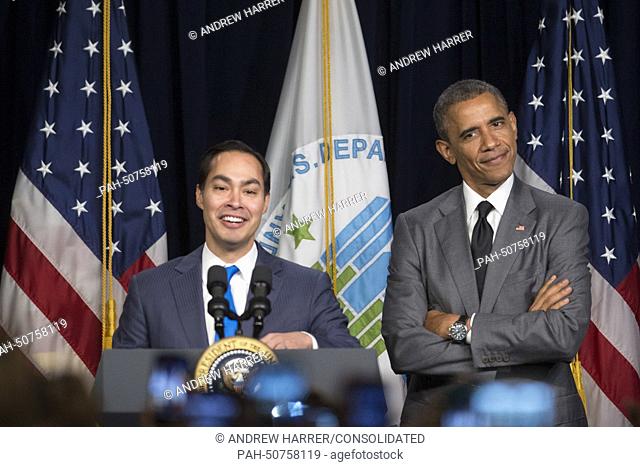 United States President Barack Obama, right, gestures to Julian Castro, Secretary of U.S. Housing and Urban Development (HUD)