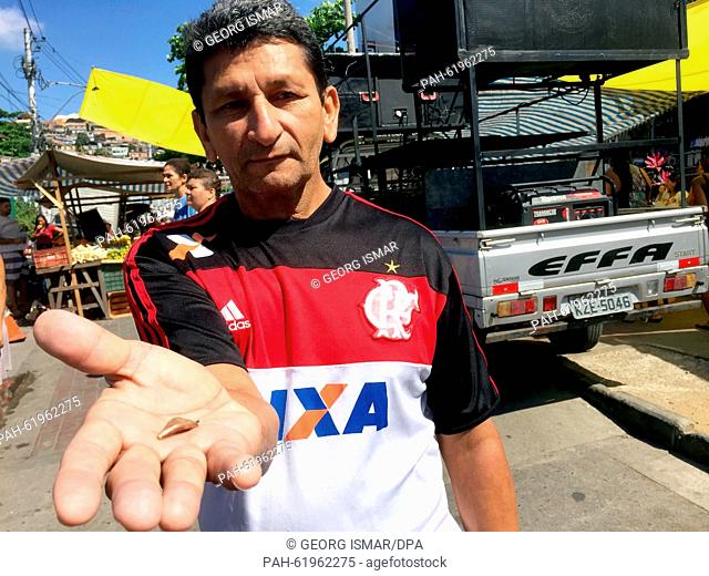 Antonio Eliais presents a bullet in his hand in the Favela Complexo do Alemao in Rio de Janeiro, Brazil, 29 August 2015. The bullet almost struck him as he was...