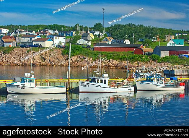 Fishing boats in coastal village. Cabot Trail. Cape Breton Island. Neils Harbour Nova Scotia Canada