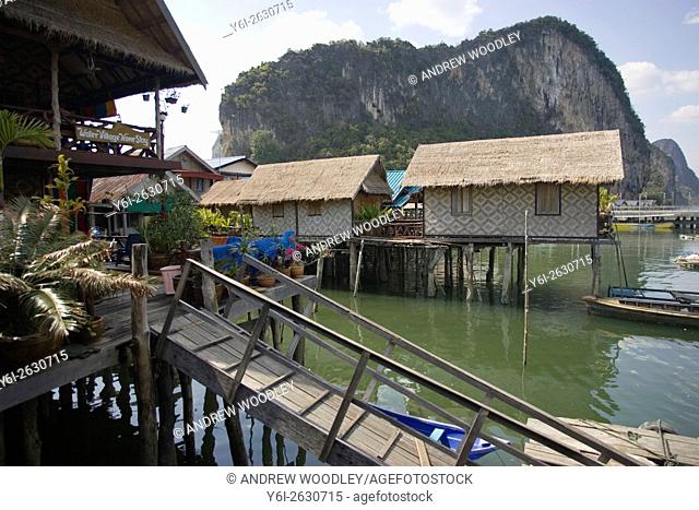 Ramps lead to Ko Panyi Muslim fishing village on stilts from floating pontoon docks Phang Nga Bay Thailand