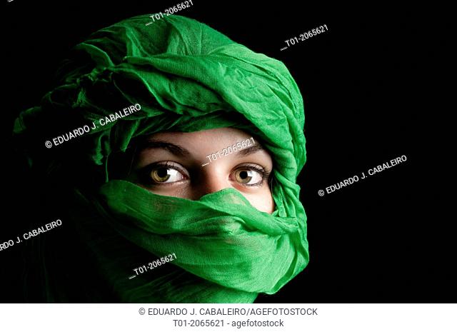 Eyes of girl with green turban
