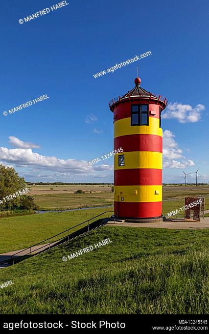 Pilsumer lighthouse, next to it bars with love locks, Pilsum, Krummhörn, East Frisia, Lower Saxony