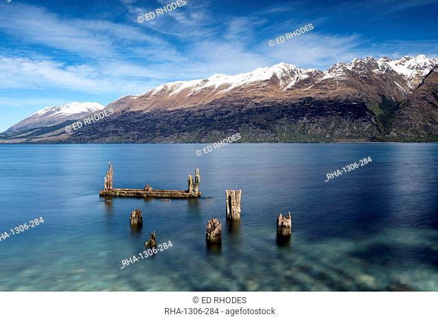 Decayed jetty, old wooden posts in Lake Wakatipu at Glenorchy, Otago Region, South Island, New Zealand, Pacific