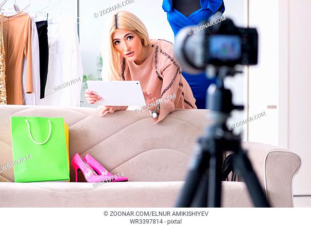 Fashion blogger recording new video for her vlog