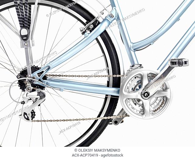 Bicycle rear wheel set of gears and pedals closeup isolated on white background
