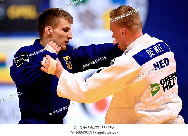 Frank De Wit (white, Netherlands) and Tim Gramkow (blue, Germany) fight in the men's 81kg body weight competition at the Judo Grand Prix in the Mitsubishi...