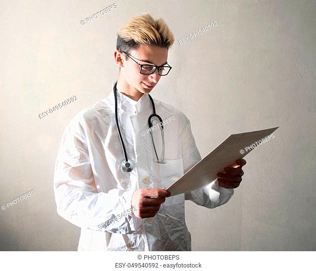 a Young Doctor consult a medical briefcase