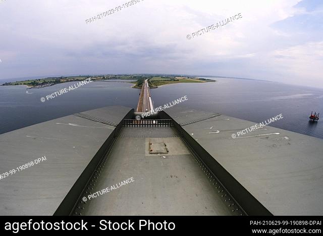 29 June 2021, Schleswig-Holstein, Fehmarn: Scaffolding can be seen from a height of 50 metres on the Fehmarnsund Bridge. Deutsche Bahn provided information on...