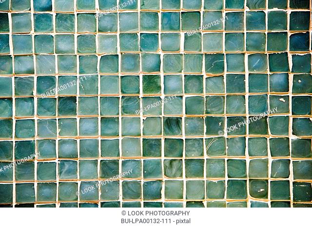Close up of turquoise backsplash tiles