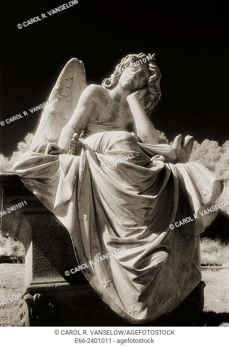 An angel waits / Black and white infrared shot of statue of angel in a cemetary