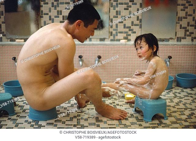 Father and son. Suginoi spa hotel. Beppu. Japan