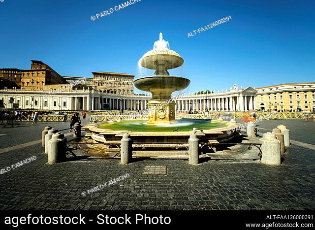 View of St. Peter's Basilica in St. Peter's Square with fountain in foreground, Vatican City, Rome