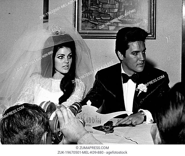 May 1, 1967 - Las Vegas, NV, U.S. - The undisputed King of Rock 'n' Roll ELVIS PRESLEY and new bride, PRISCILLA on their wedding day in Las Vegas