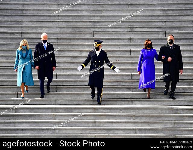 President of the United States Joe Biden, First Lady Jill Biden, U.S. Vice President Kamala Harris and First Gentleman Douglas Emhoff walk down the east steps...