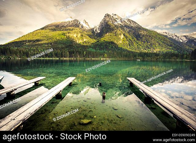 Colorful summer sunrise on the Hintersee lake with white pleasure launches. Sunny morning scene in Austrian Alps. Salzburg-Umgebung, Austria, Europe