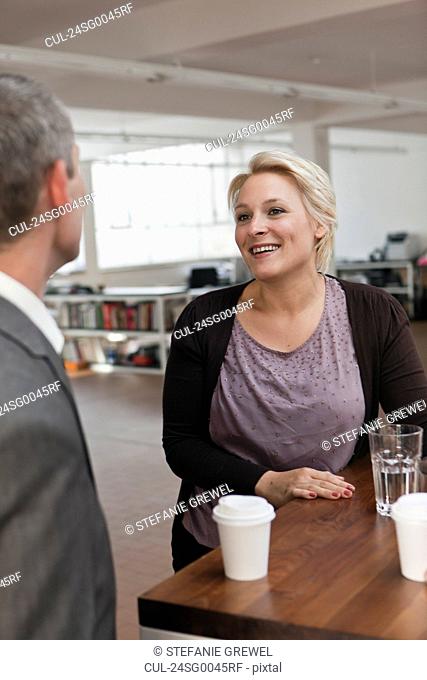 Woman smiling in the break room