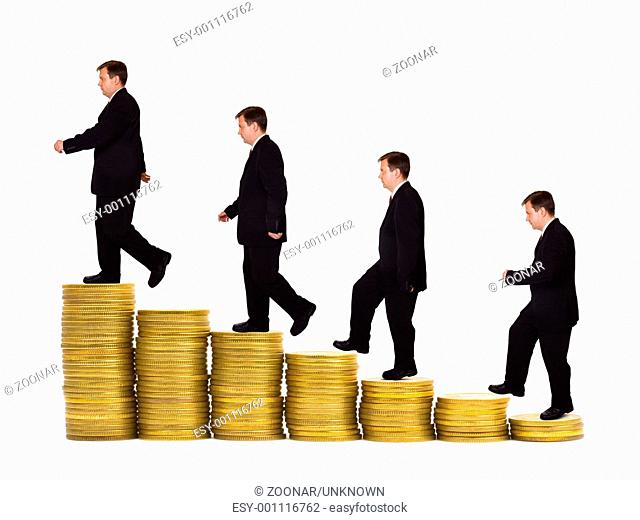 Businessman on money staircase