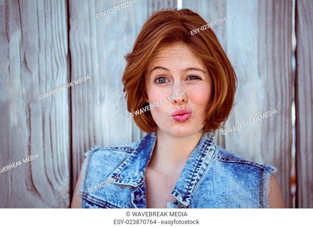 beautiful hipster woman making a funny face