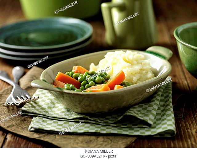 Maris Piper mashed potatoes, peas and carrots