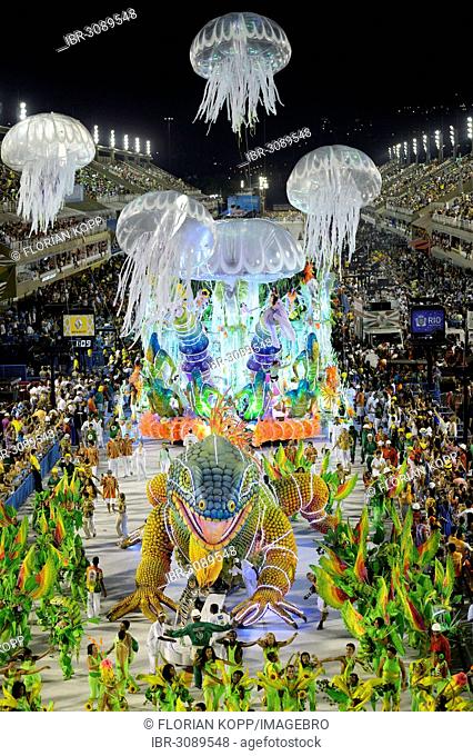 Giant green iguana and float with an underwater scenery, parade of the Academicos do Grande Rio samba school during the Carnival in Rio de Janeiro in 2013