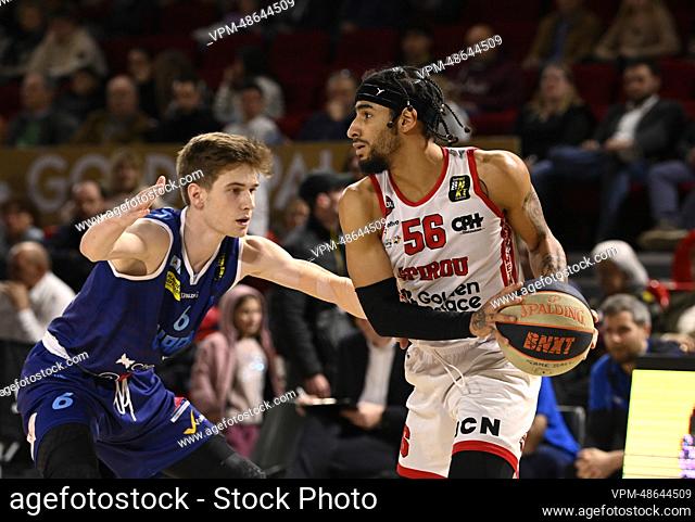 Aalst's Glenn Temmerman and Spirou's Jhiwan Jackson fight for the ball during a basketball match between Spirou Charleroi and Okapi Aalst