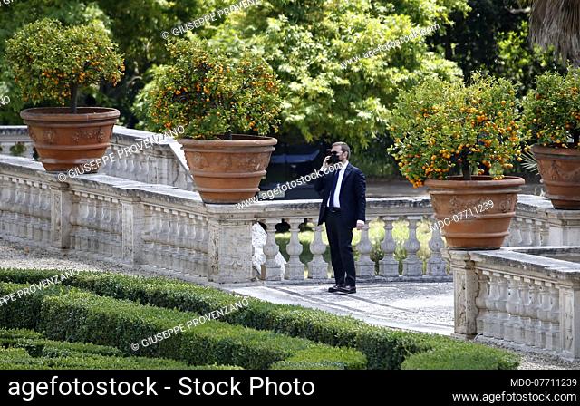 Italian minister Giuseppe Provenzano speaks on the phone in the gardens of the Casina del buon respiro, inside Villa Pamphilj