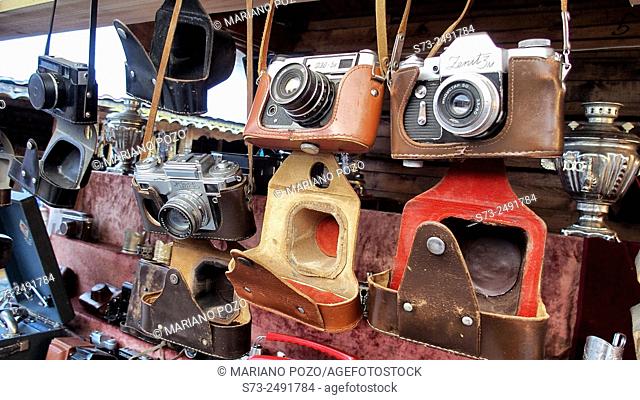 Old cameras in a street market. Moscow, Russia