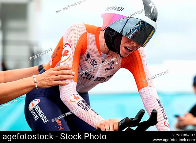 Dutch Demi Vollering looks tired after crossing the finishline the elite women time trial race at the UCI World Championships Cycling, in Glasgow, Scotland