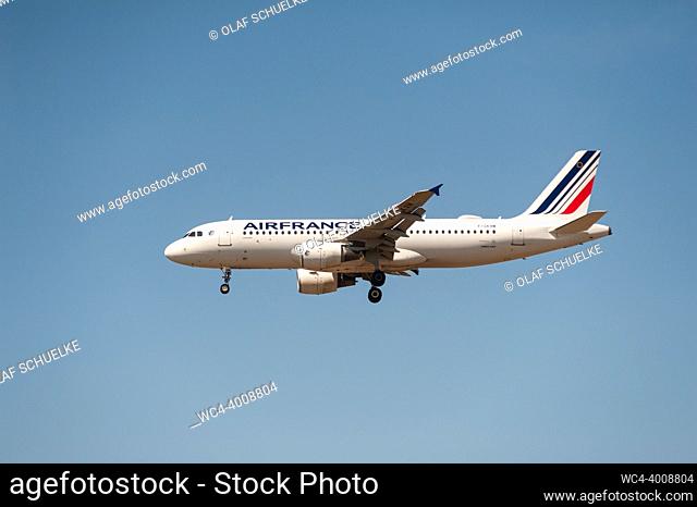 Berlin, Germany, Europe - An Air France Airbus A320-200 passenger aircraft with the registration F-GKXM approaches Berlin Brandenburg Airport BER for landing
