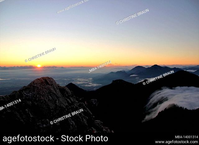 hike to the summit of the kampenwand (1669 m) in chiemgau, view over the sea of clouds, chiemgau alps, chiemsee, sonnenaufgagn, near aschau, upper bavaria