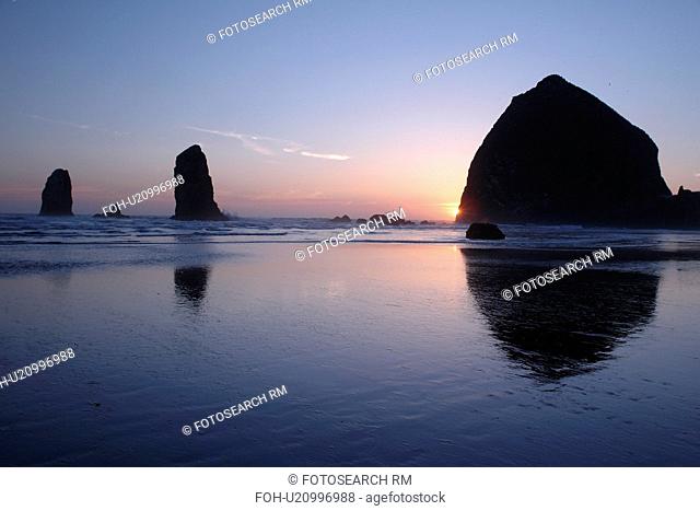 Cannon Beach, OR, Oregon, Pacific Ocean, Pacific Coast Scenic Byway, Rt Route, Highway 101, Cannon Beach, Haystack Rock, reflection, sunset