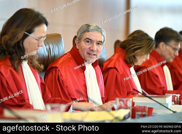 20 December 2023, Baden-Württemberg, Karlsruhe: The First Senate of the Federal Constitutional Court, (l-r) Ines Härtel, Stephan Harbarth (Chairman of the...