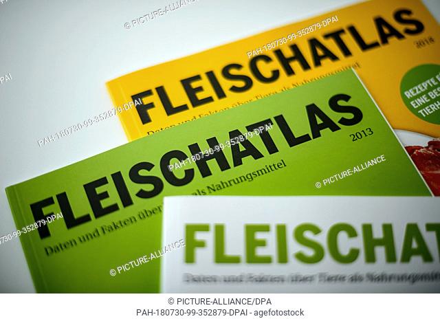 09 July 2018, Germany, Berlin: The meat magazine 'Fleischatlas' lies on a table. In it, the Heinrich Boell Foundation explains improvement strategies for the...