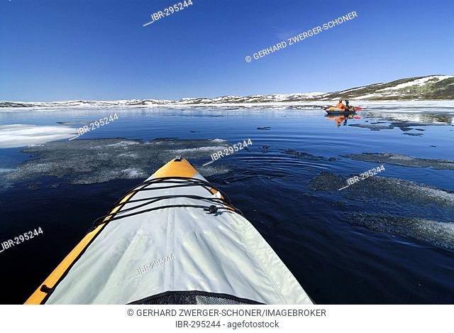 Canoe, lake with ice floes, Jotunheimen national park, Vaga, Oppland, Norway
