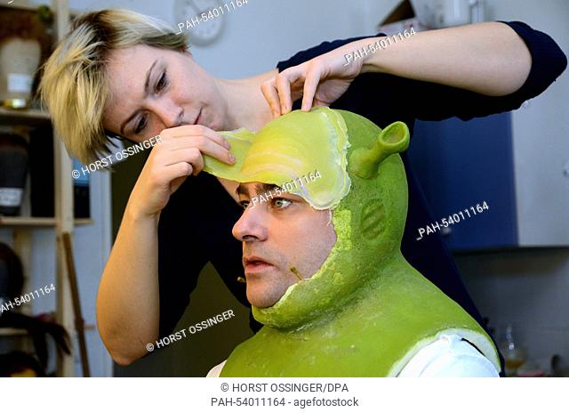 EXCLUSIVE - Musical-actor Frank Winkels sits in the makeup-chair as he is being masked as green Oger of Broadway-Musical ""Shrek"" in Capitol Theatre, Germany