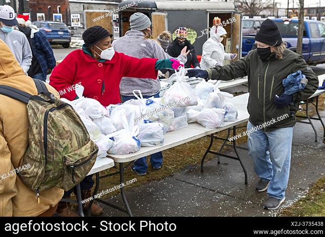 Detroit, Michigan USA - 19 December 2020 - In the week before Christmas, volunteers deliver food to people in need, most of them homeless