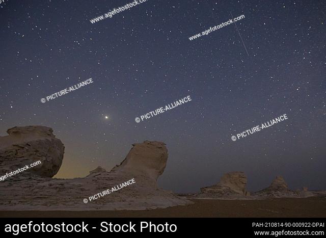 13 August 2021, Egypt, Farafra: A Picture taken on 13 August shows the Perseid meteor shower over the White Desert north of the Farafra Oasis in the New Valley...