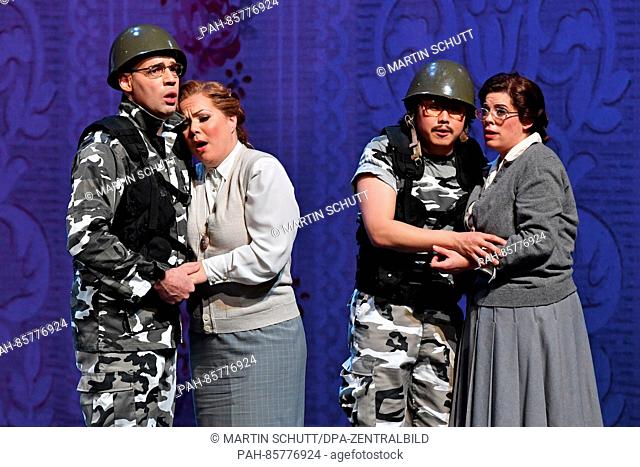 Mate Solyom-Nagy as Guglielmo (L-R), Margarete Fredheim as Fiordiligi, Won Whi Choi as Ferrando and Katja Bildt as Dorabella rehearse a scene from the opera...