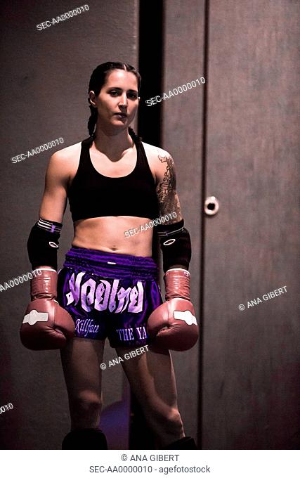Portrait of young female boxer