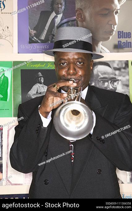 African man performing on trumpet