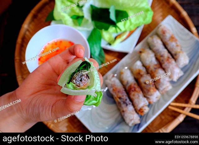 Eating spring roll pastry or cha gio is popular food at Vietnam cuisine, stuffing from meat and wrapper by rice paper, then deep fried