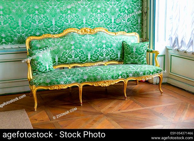 Vintage luxury Green sofa near window