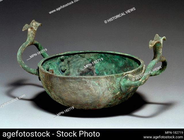 Bronze bowl with handles terminating in lotuses. Period: Cypro-Geometric III; Date: ca. 850-750 B.C; Culture: Cypriot; Medium: Bronze; Dimensions: H