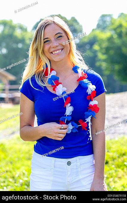 A patriotic blonde model having fun during the 4th of July holiday