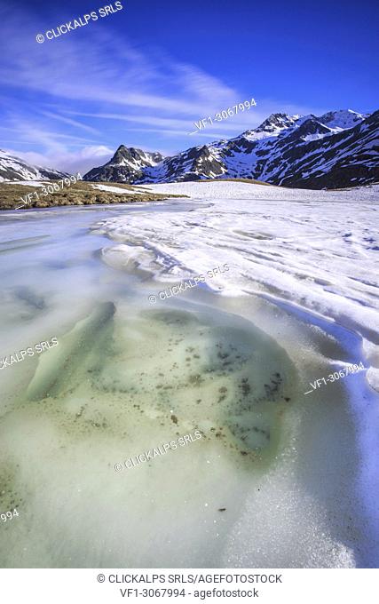 Spring thaw at Lake Andossi, Chiavenna Valley, Spluga Valley, Sondrio province, Valtellina, Lombardy, Italy