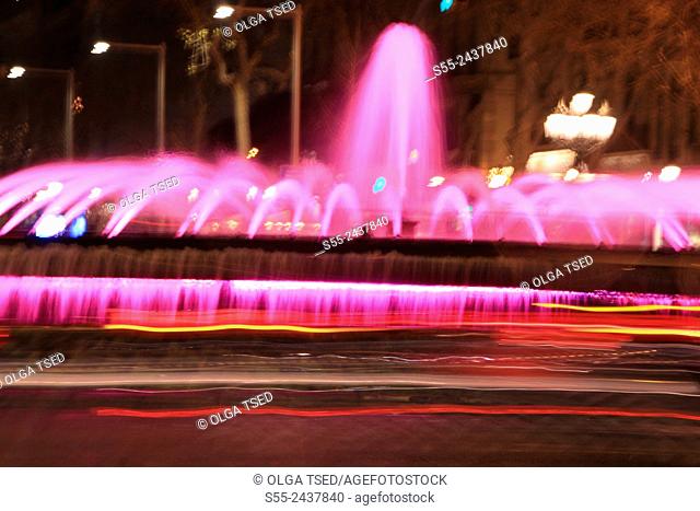 Pink fonts at the cross of Passeig de Gracia and Gran Via. Barcelona, Catalonia, Spain